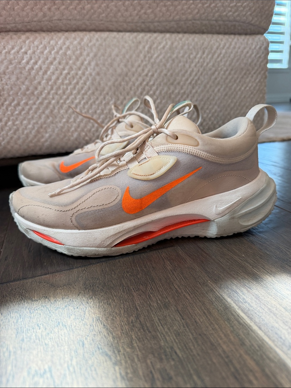 Nike Women's Beige Sneakers with Bright Orange Swoosh